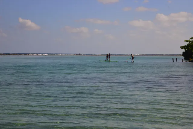 Paddleboarding calm water — Isla Marisol Resort, Belize